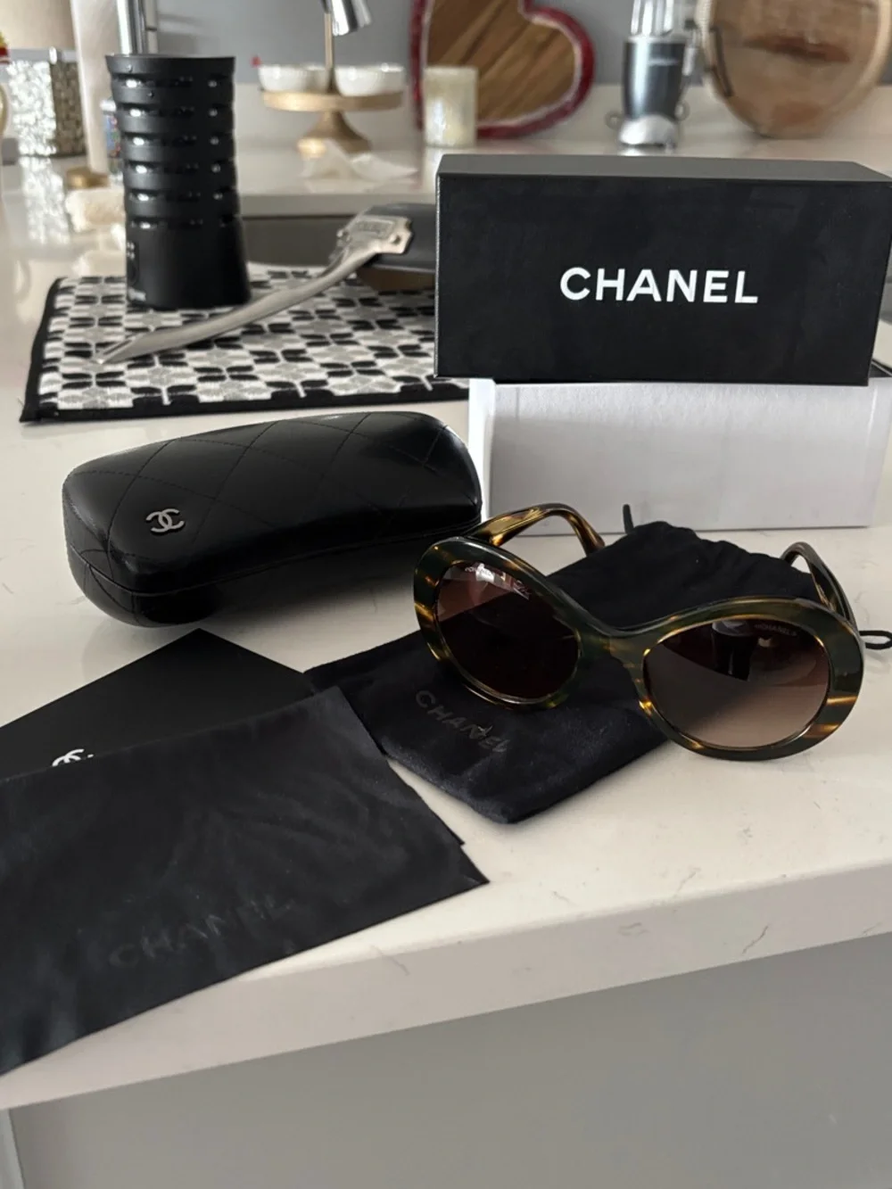 CHANEL Tortoiseshell Oval Sunglasses with Brown Gradient Lenses